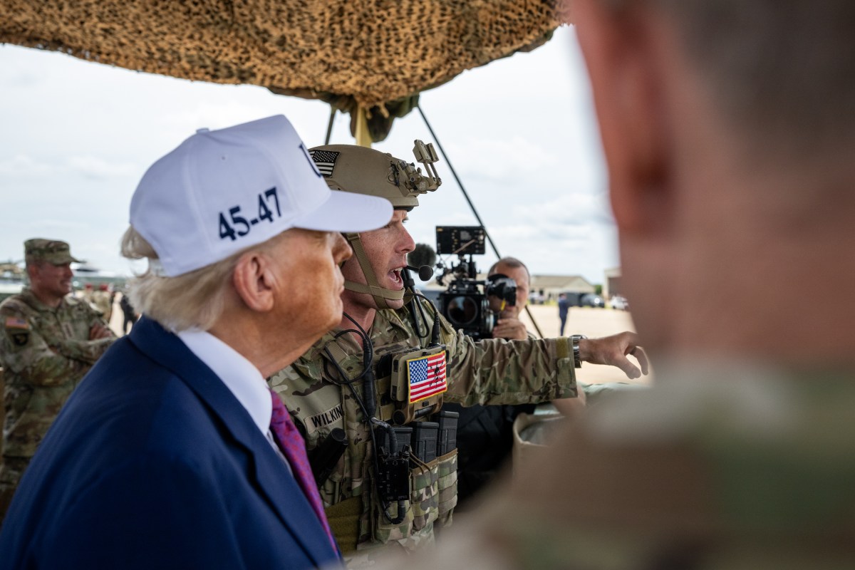 President Donald Trump observes a military demonstration at Fort Bragg, North Carolina on Tuesday, June 10, 2025, during a visit to commemorate the 250th anniversary of the U.S. Army. (Official White House Photo by Daniel Torok)