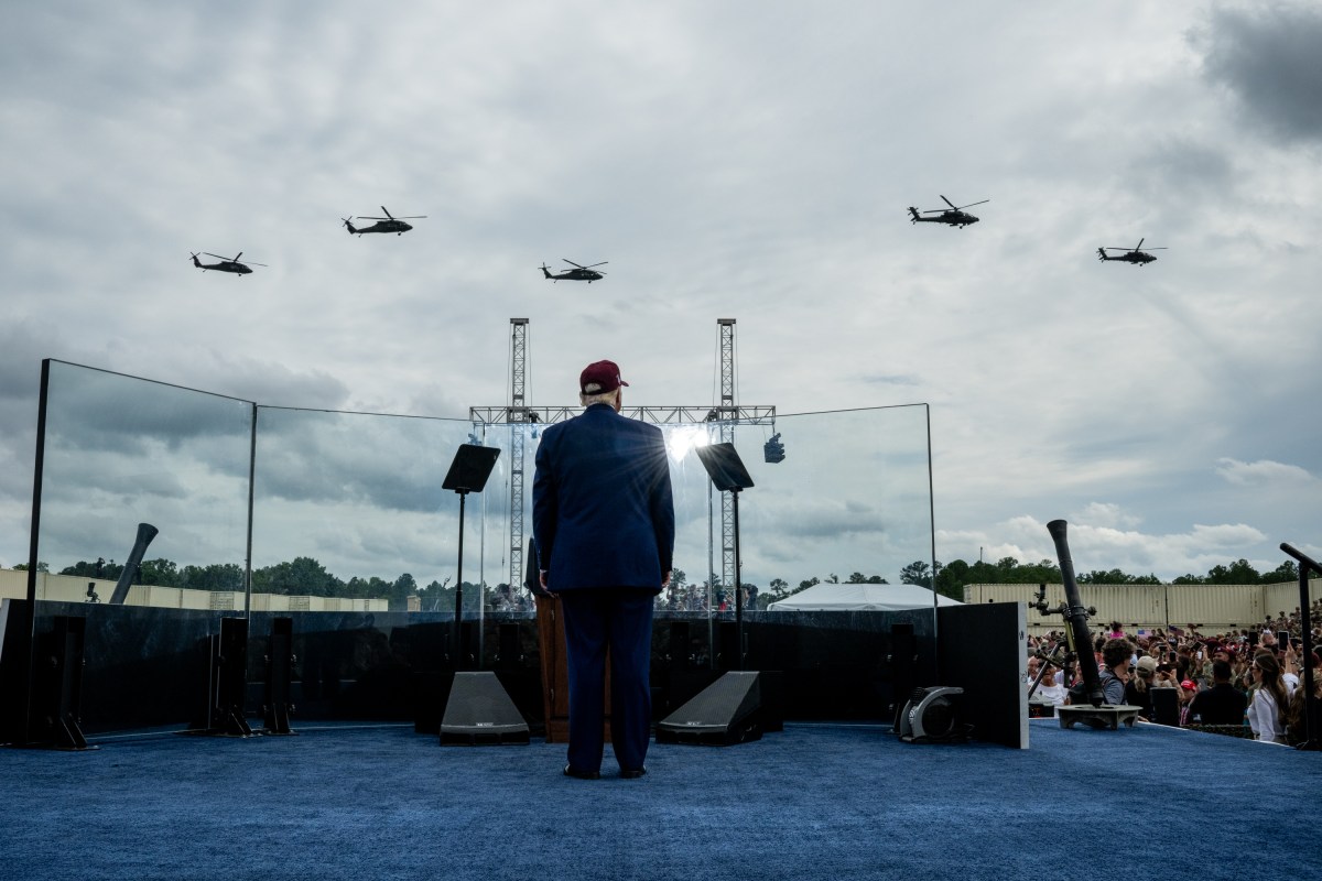Military helicopters fly by as President Donald Trump begins his remarks at Fort Bragg, North Carolina on Tuesday, June 10, 2025, during a visit to commemorate the 250th anniversary of the U.S. Army. (Official White House Photo by Daniel Torok)