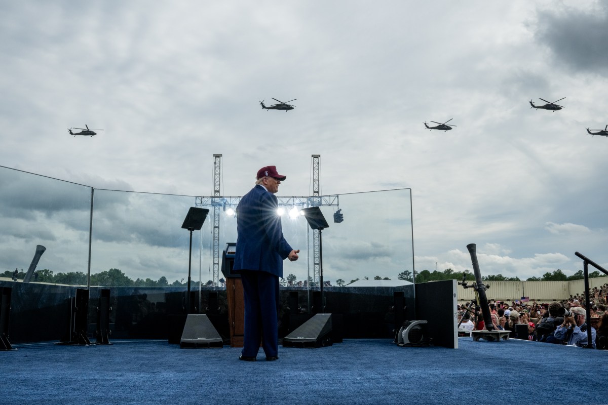 Military helicopters fly by as President Donald Trump begins his remarks at Fort Bragg, North Carolina on Tuesday, June 10, 2025, during a visit to commemorate the 250th anniversary of the U.S. Army. (Official White House Photo by Daniel Torok)