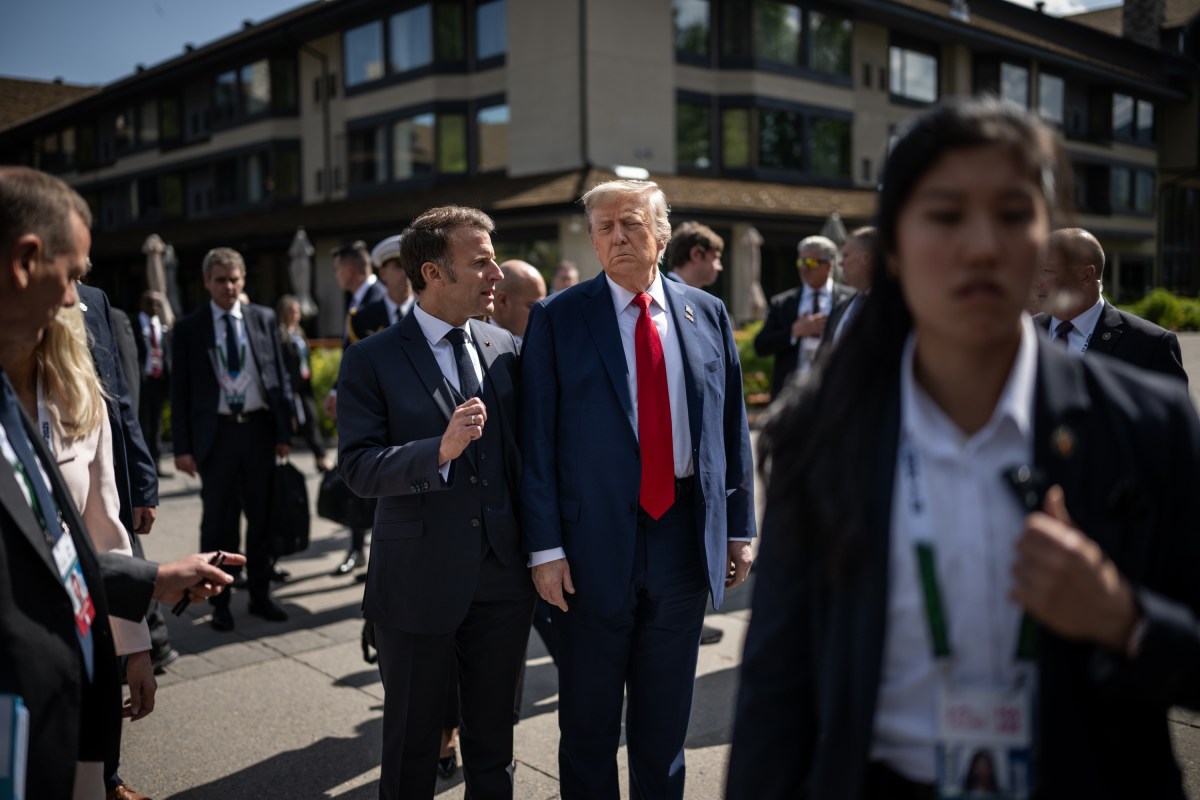 President Donald Trump talks with French President Emmanuel Macron before a welcome ceremony at the G7 Summit, Monday, June 16, 2025, in Kananaskis, Alberta, Canada. (Official White House Photo by Daniel Torok)