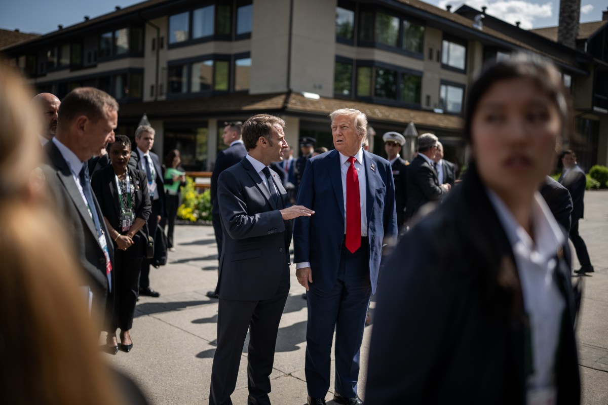 President Donald Trump talks with French President Emmanuel Macron before a welcome ceremony at the G7 Summit, Monday, June 16, 2025, in Kananaskis, Alberta, Canada. (Official White House Photo by Daniel Torok)