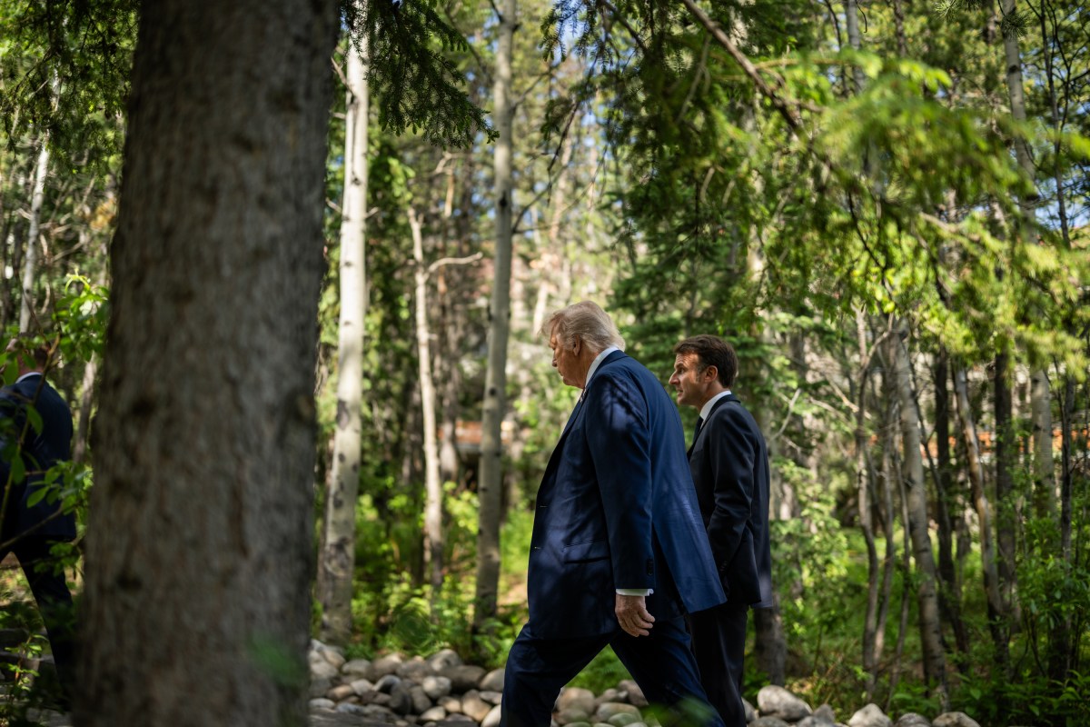 President Donald Trump talks with French President Emmanuel Macron before a welcome ceremony at the G7 Summit, Monday, June 16, 2025, in Kananaskis, Alberta, Canada. (Official White House Photo by Daniel Torok)