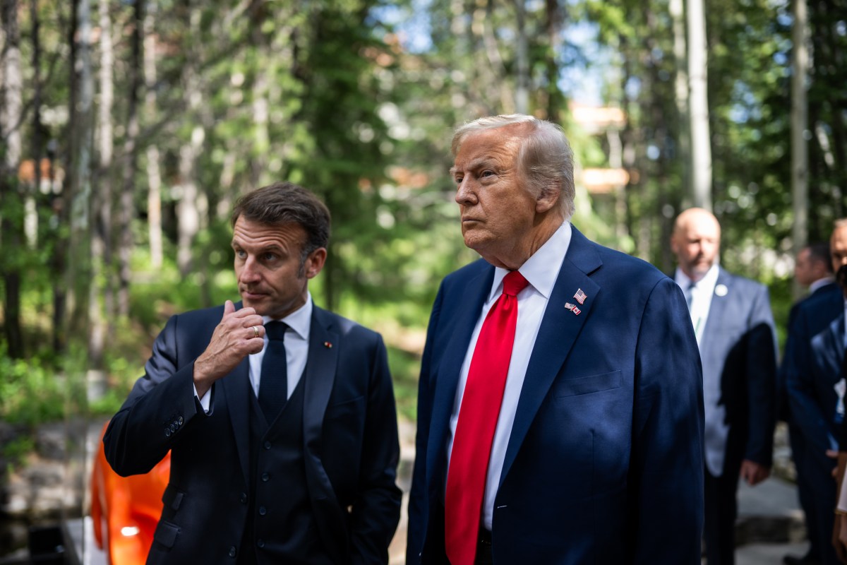 President Donald Trump talks with French President Emmanuel Macron before a welcome ceremony at the G7 Summit, Monday, June 16, 2025, in Kananaskis, Alberta, Canada. (Official White House Photo by Daniel Torok)