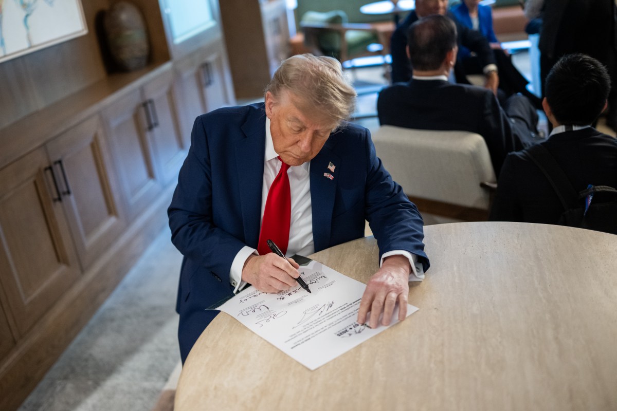 President Donald Trump signs a document at the the G7 Summit, Monday, June 16, 2025, in Kananaskis, Alberta, Canada. (Official White House Photo by Daniel Torok)