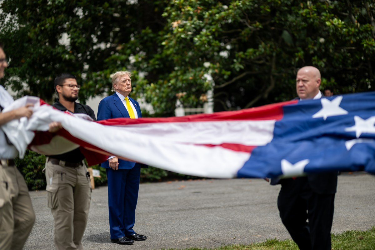 President Donald Trump watches as the American flag is raised on the newly-installed flagpole on the South Lawn of the White House, Wednesday, June 18, 2025. (Official White House Photo by Daniel Torok)