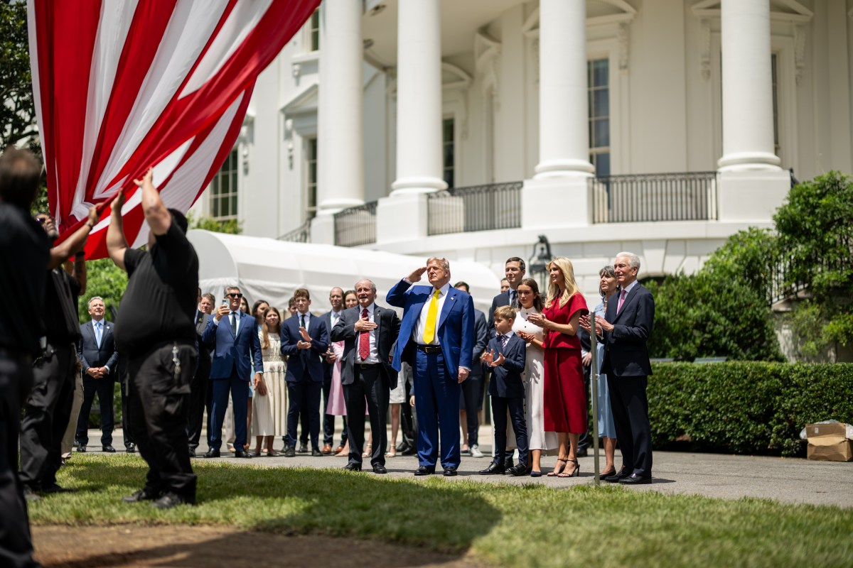 President Donald Trump watches as the American flag is raised on the newly-installed flagpole on the South Lawn of the White House, Wednesday, June 18, 2025. (Official White House Photo by Daniel Torok)