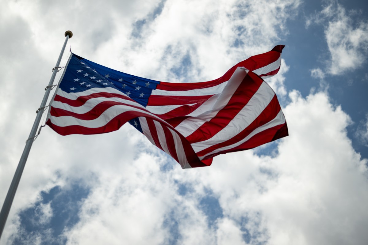 President Donald Trump watches as the American flag is raised on the newly-installed flagpole on the South Lawn of the White House, Wednesday, June 18, 2025. (Official White House Photo by Daniel Torok)
