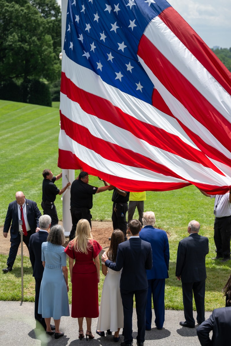 President Donald Trump watches as the American flag is raised on the newly-installed flagpole on the South Lawn of the White House, Wednesday, June 18, 2025. (Official White House Photo by Molly Riley)