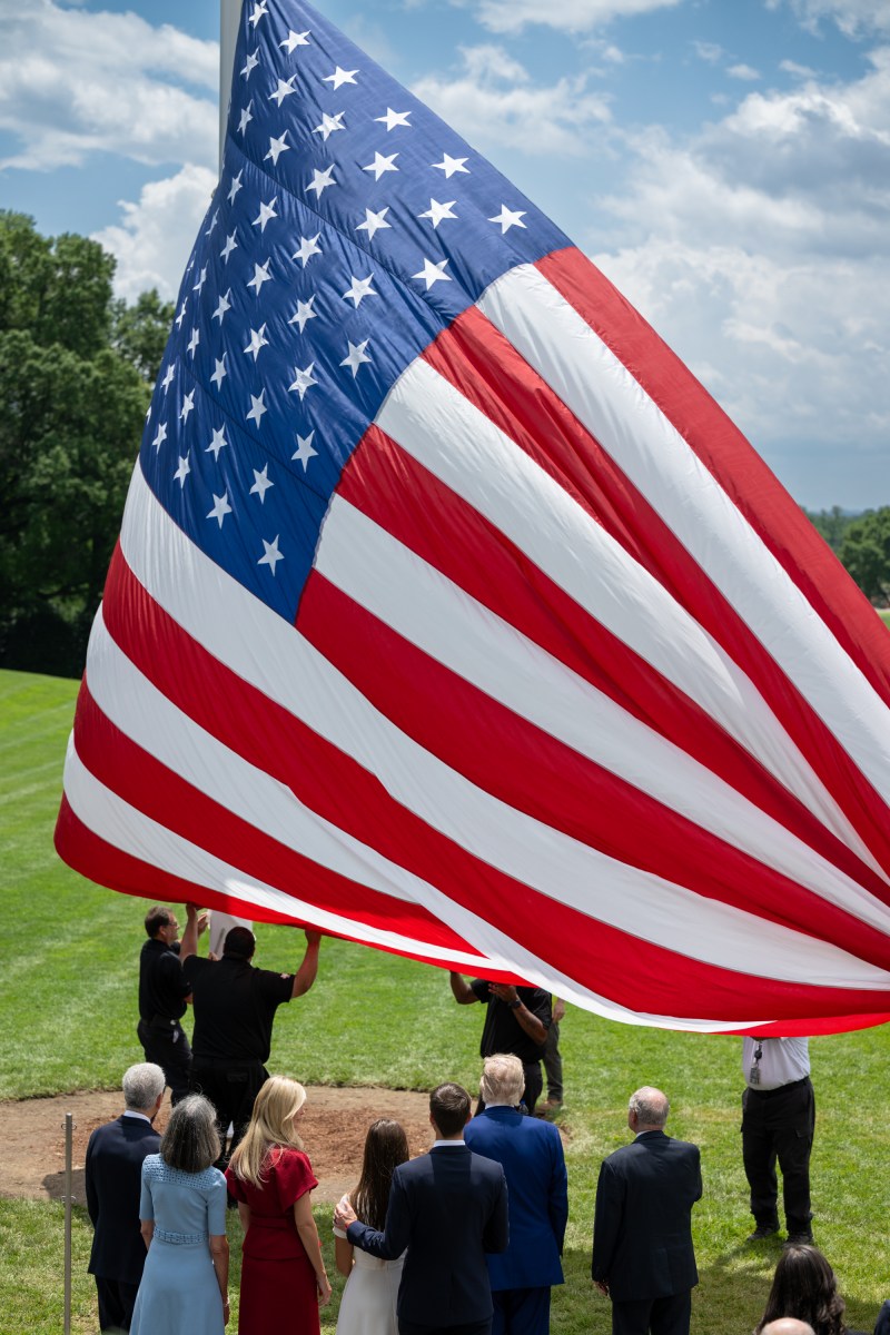 President Donald Trump watches as the American flag is raised on the newly-installed flagpole on the South Lawn of the White House, Wednesday, June 18, 2025. (Official White House Photo by Molly Riley)
