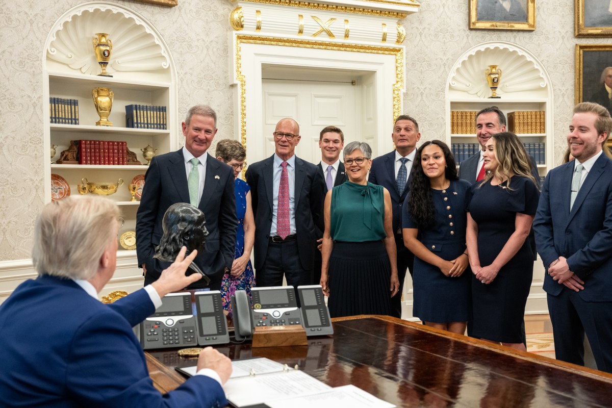 President Donald Trump speaks with Edward Walsh and family before he was sworn in as U.S. Ambassador to Ireland, Thursday, June 19, 2025, in the Oval Office. (Official White House Photo by Molly Riley)