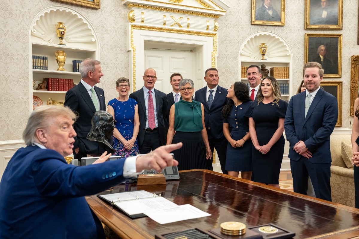 President Donald Trump speaks with Edward Walsh and family before he was sworn in as U.S. Ambassador to Ireland, Thursday, June 19, 2025, in the Oval Office. (Official White House Photo by Molly Riley)