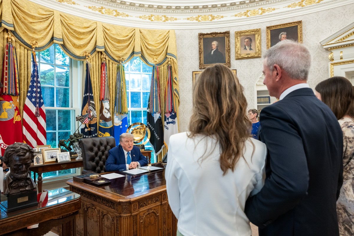 President Donald Trump speaks with Edward Walsh and family before he was sworn in as U.S. Ambassador to Ireland, Thursday, June 19, 2025, in the Oval Office. (Official White House Photo by Molly Riley)