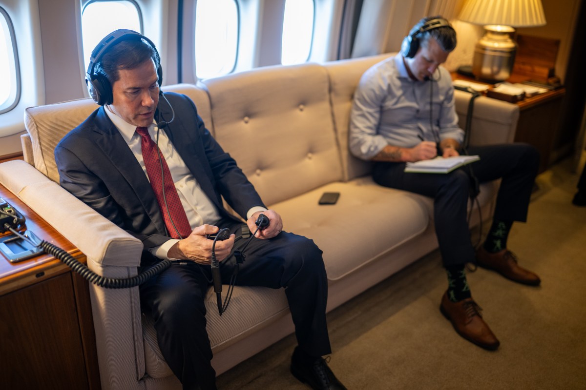 Secretary of State Marco Rubio and Secretary of Defense Pete Hegseth work on board Air Force One on Tuesday, June 24, 2025, en route to the 2025 NATO Summit in The Hague, Netherlands. (Official White House Photo by Daniel Torok)