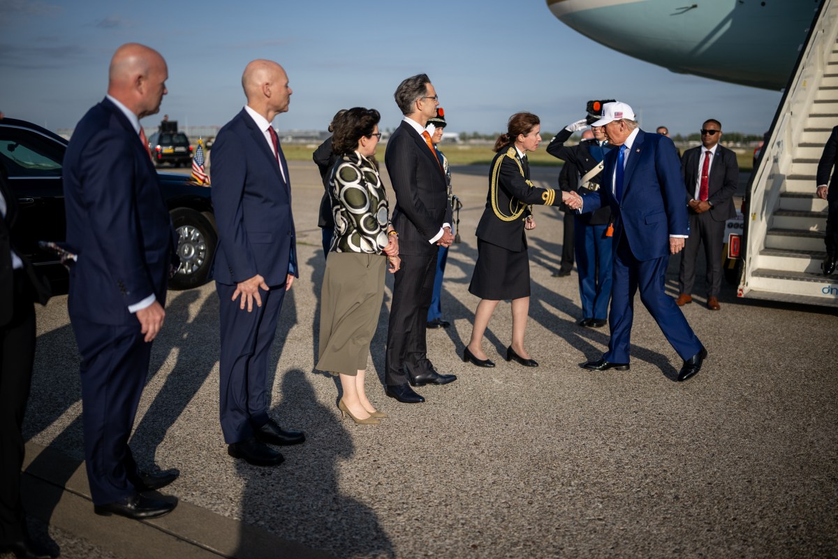 President Donald Trump is greeted by officials after his arrival at Amsterdam’s Schiphol Airport, Tuesday, June 24, 2025, ahead of the 2025 NATO Summit in The Hague, Netherlands. (Official White House Photo by Daniel Torok)