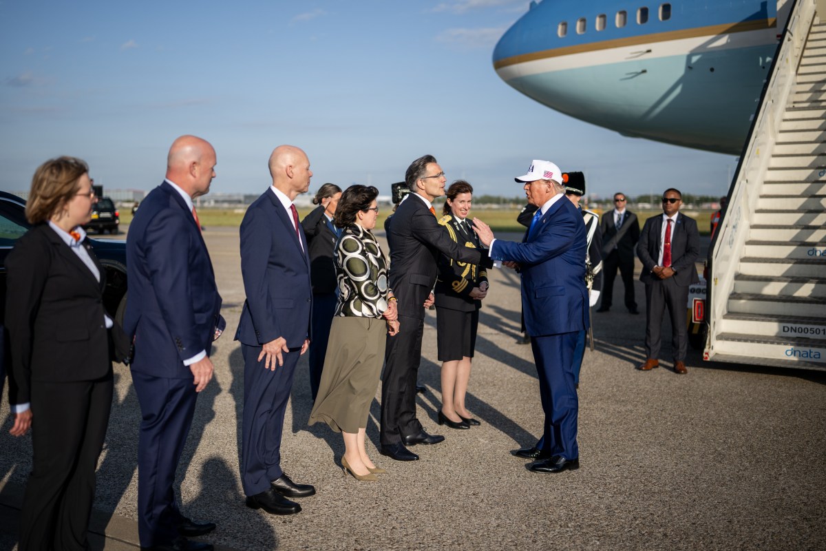 President Donald Trump is greeted by officials after his arrival at Amsterdam’s Schiphol Airport, Tuesday, June 24, 2025, ahead of the 2025 NATO Summit in The Hague, Netherlands. (Official White House Photo by Daniel Torok)