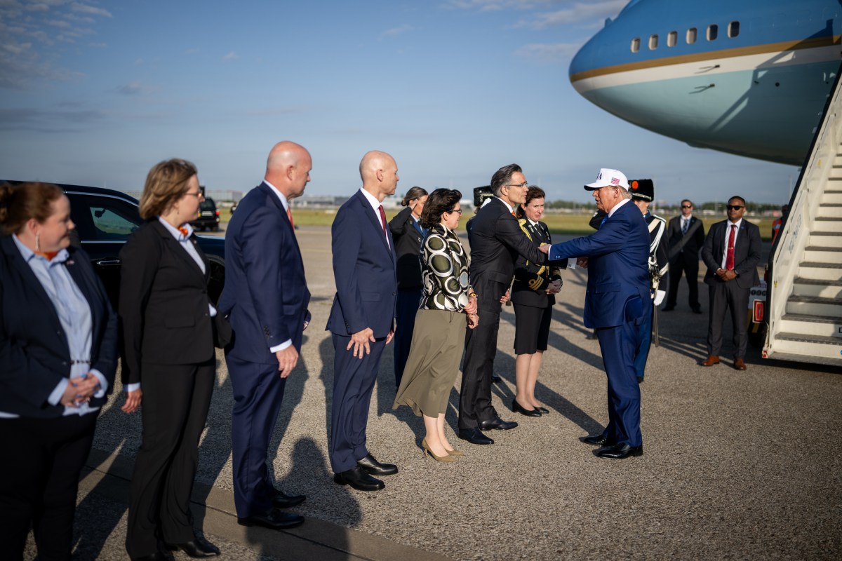 President Donald Trump is greeted by officials after his arrival at Amsterdam’s Schiphol Airport, Tuesday, June 24, 2025, ahead of the 2025 NATO Summit in The Hague, Netherlands. (Official White House Photo by Daniel Torok)