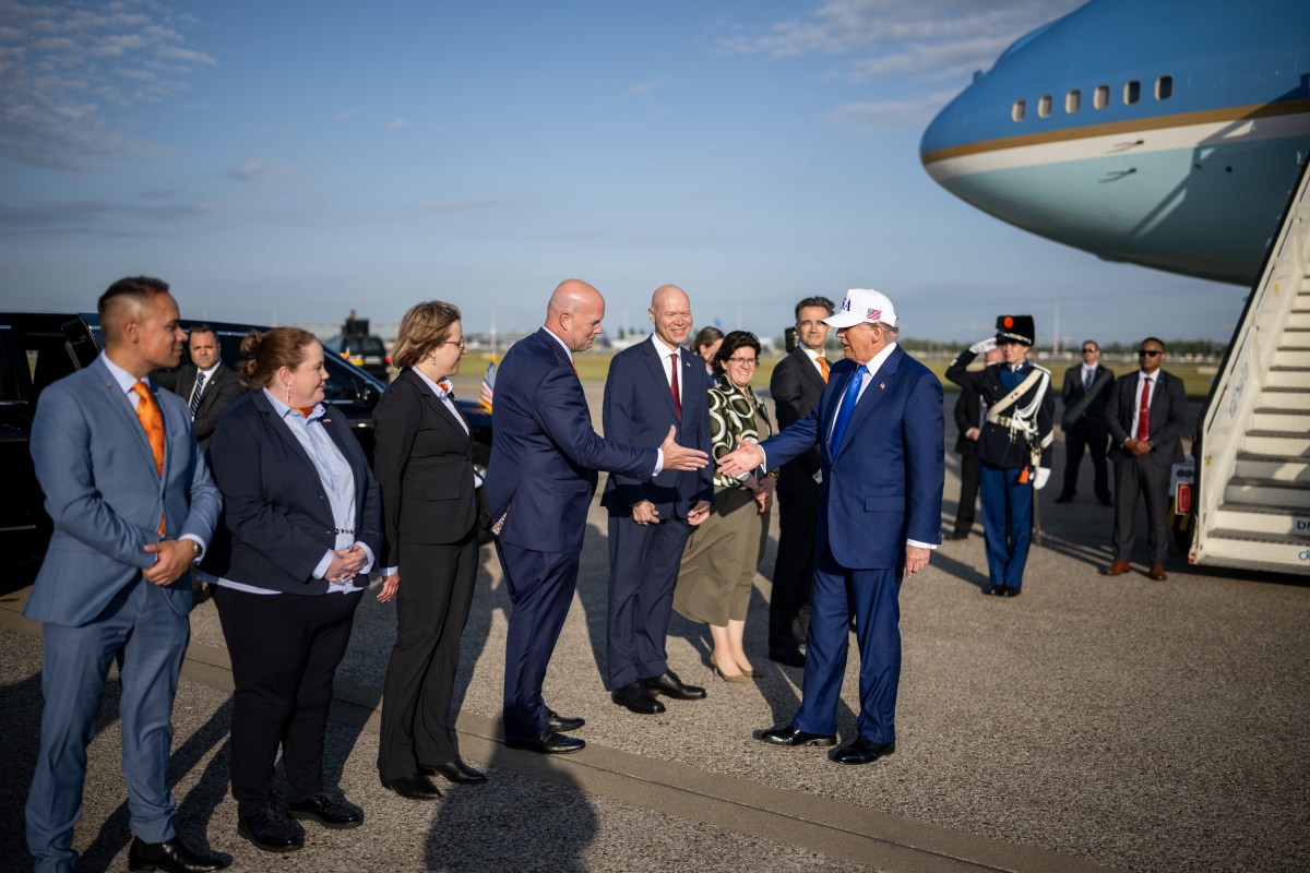 President Donald Trump is greeted by officials after his arrival at Amsterdam’s Schiphol Airport, Tuesday, June 24, 2025, ahead of the 2025 NATO Summit in The Hague, Netherlands. (Official White House Photo by Daniel Torok)