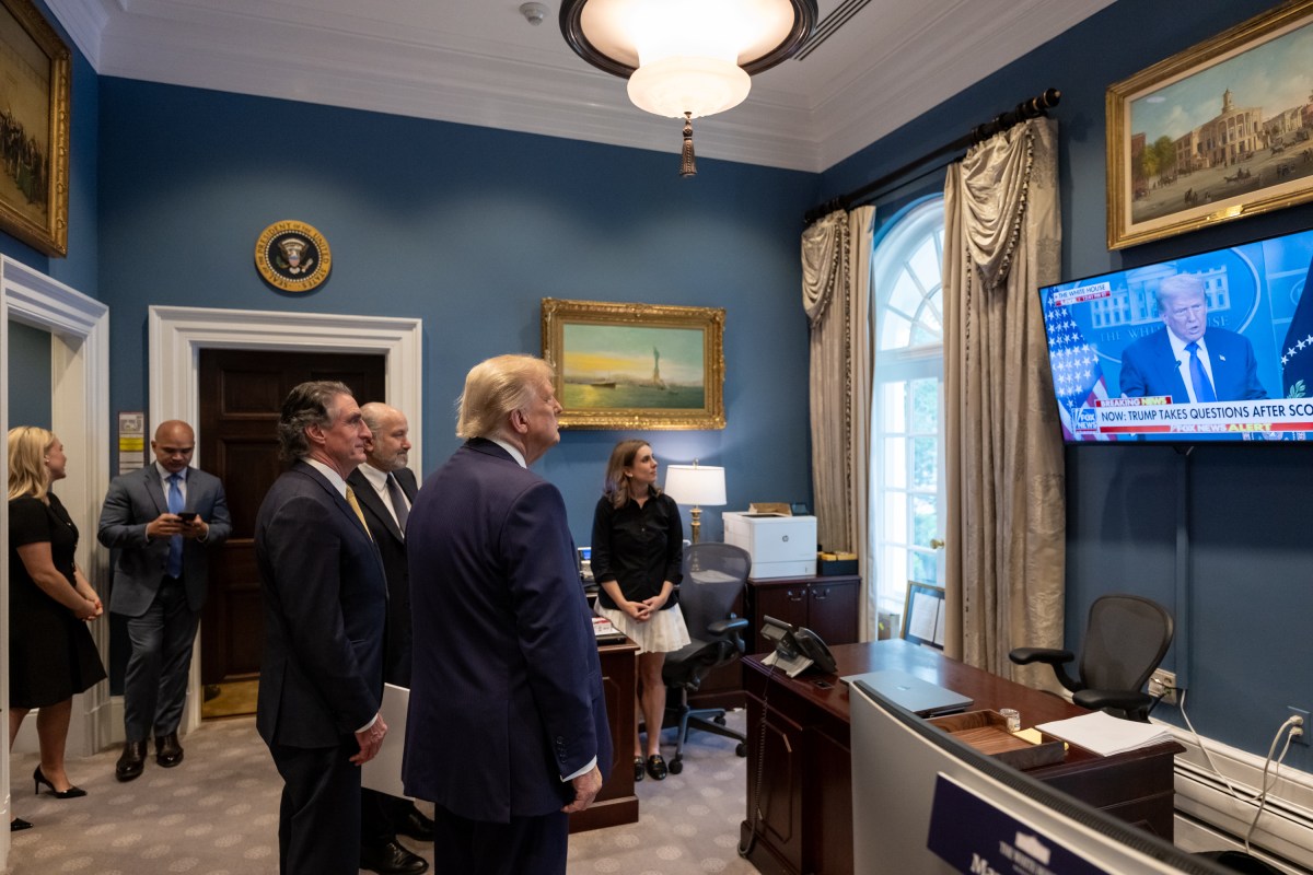 President Donald Trump watches a recap of his press conference in the Outer Oval on Friday, June 27, 2025. (Official White House Photo by Molly Riley)