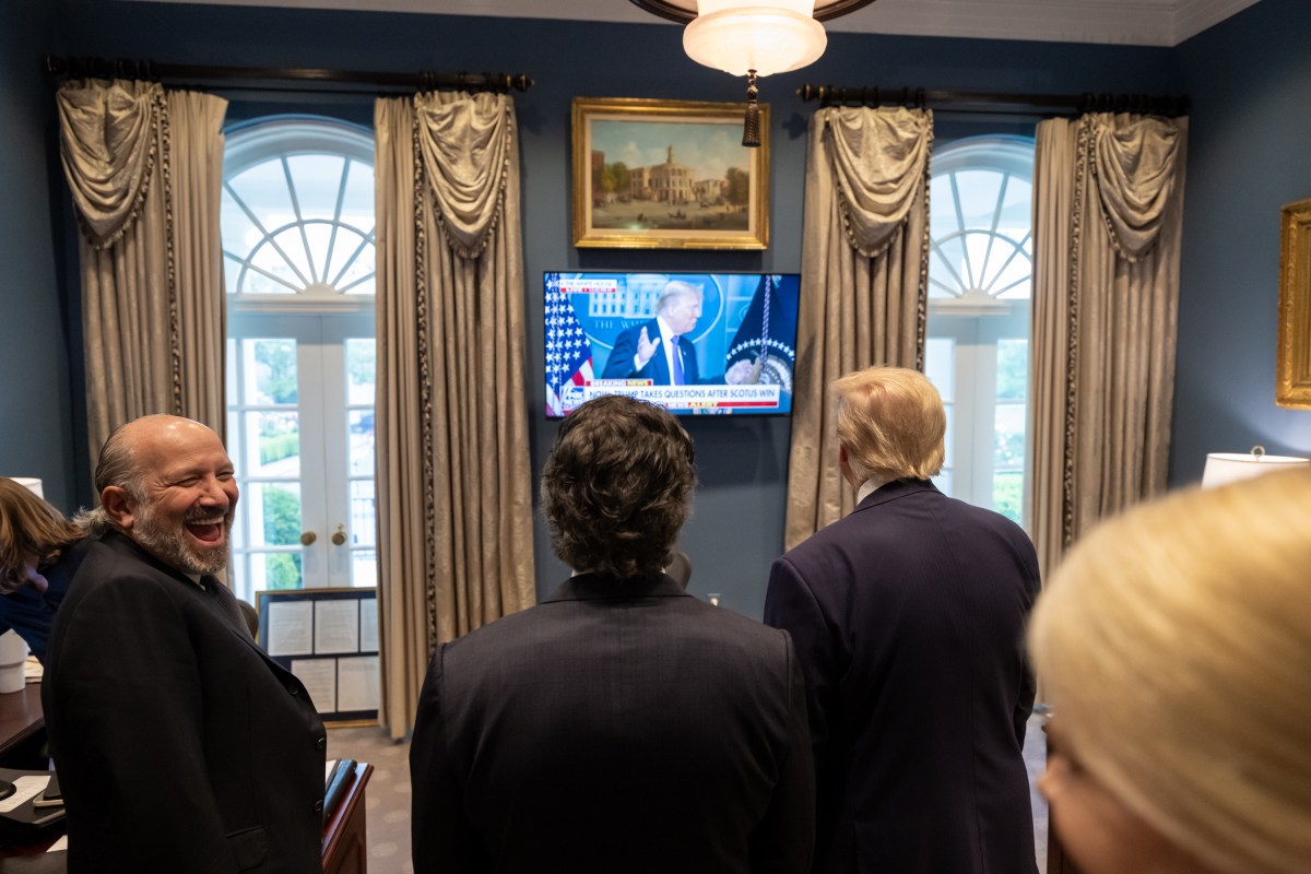 President Donald Trump watches a recap of his press conference in the Outer Oval on Friday, June 27, 2025. (Official White House Photo by Molly Riley)