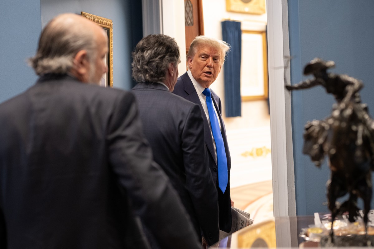President Donald Trump watches a recap of his press conference in the Outer Oval on Friday, June 27, 2025. (Official White House Photo by Molly Riley)