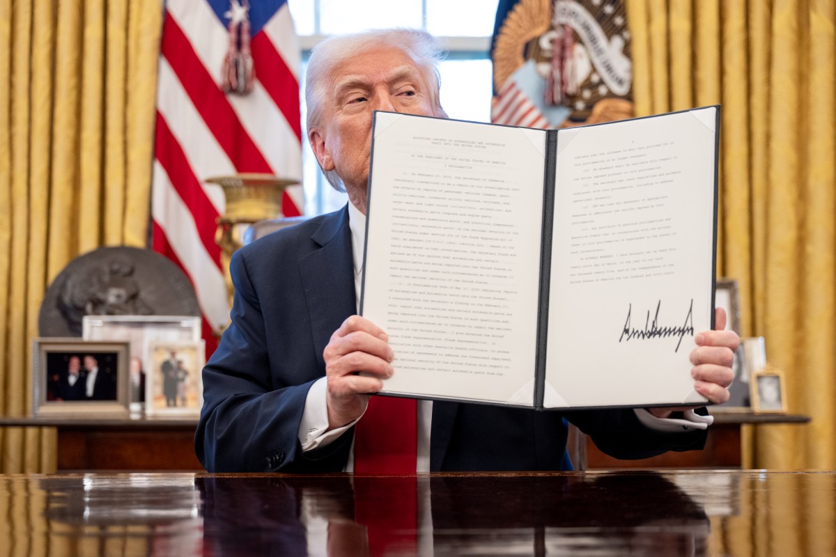 President Donald Trump announces tariffs on auto imports in the Oval Office, Wednesday, March 26, 2025. (Official White House Photo by Molly Riley)