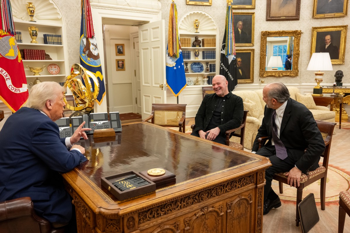 President Donald Trump signs an Executive Order alongside Kid Rock in the Oval Office, Monday, March 31, 2025. (Official White House Photo by Molly Riley)