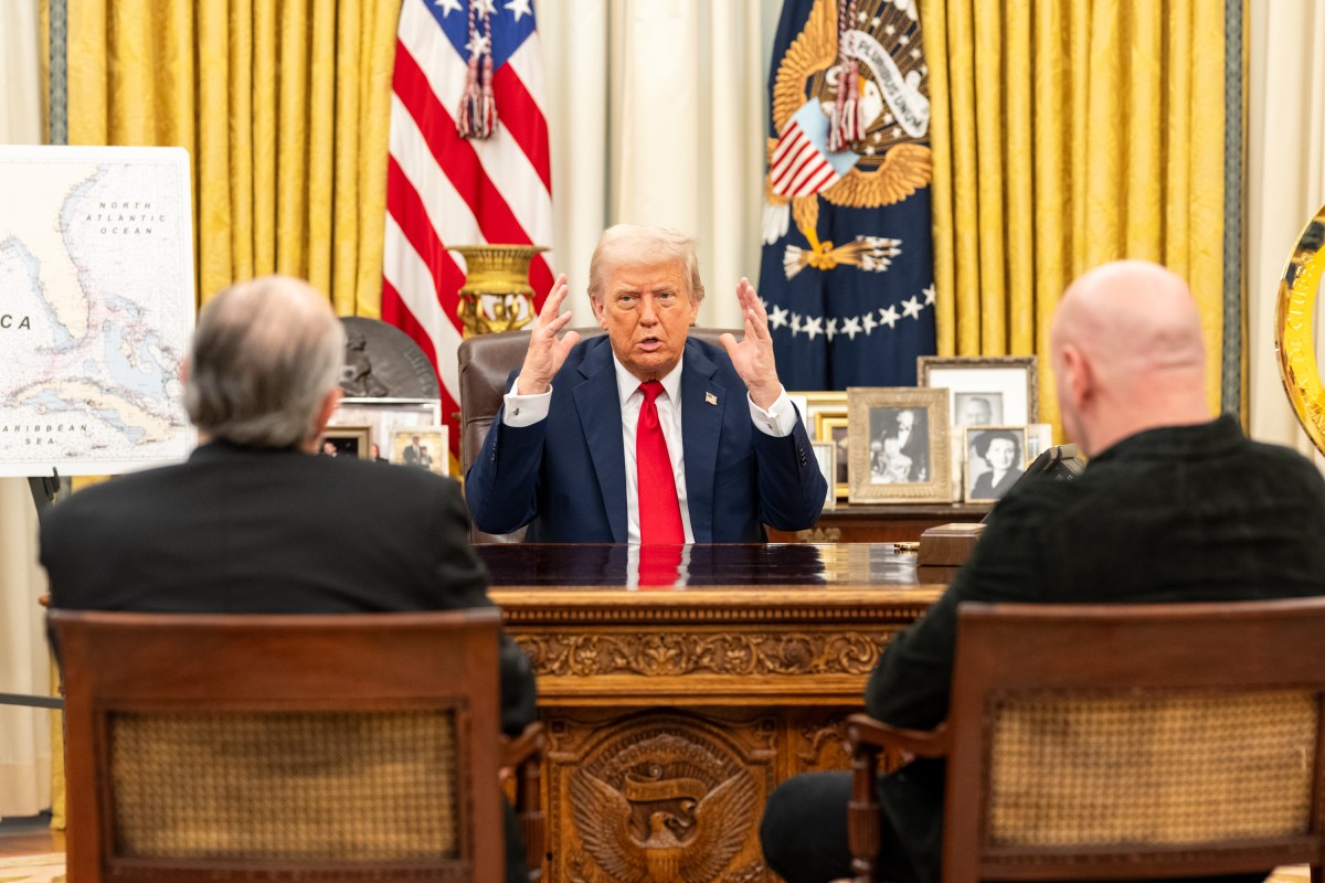 President Donald Trump signs an Executive Order alongside Kid Rock in the Oval Office, Monday, March 31, 2025. (Official White House Photo by Molly Riley)