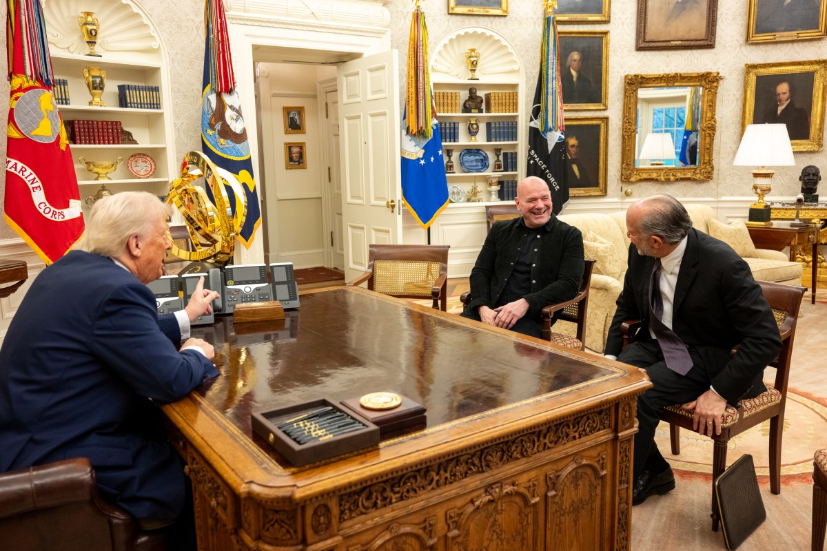 President Donald Trump signs an Executive Order alongside Kid Rock in the Oval Office, Monday, March 31, 2025. (Official White House Photo by Molly Riley)