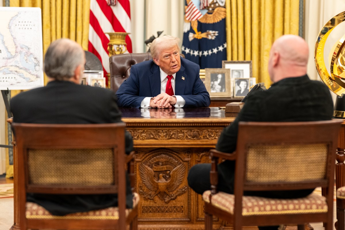 President Donald Trump signs an Executive Order alongside Kid Rock in the Oval Office, Monday, March 31, 2025. (Official White House Photo by Molly Riley)