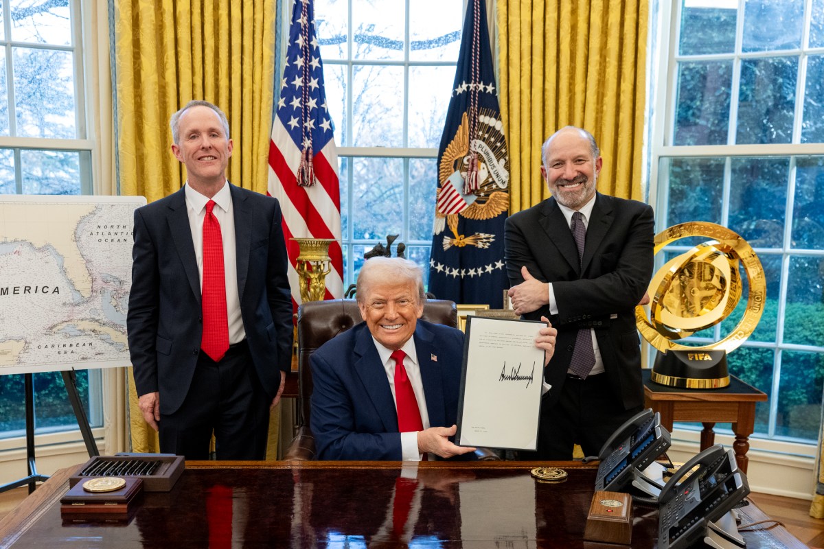 President Donald Trump signs an Executive Order alongside Kid Rock in the Oval Office, Monday, March 31, 2025. (Official White House Photo by Molly Riley)