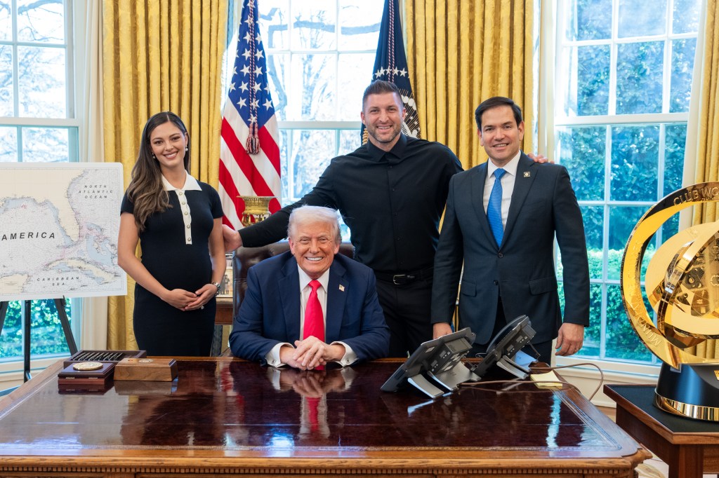 President Donald Trump poses for photos with Tim Tebow, his wife Demi-Leigh Tebow, and Secretary of State Marco Rubio, in the Oval Office, Tuesday, April 1, 2025. (Official White House Photo by Joyce N. Boghosian)
