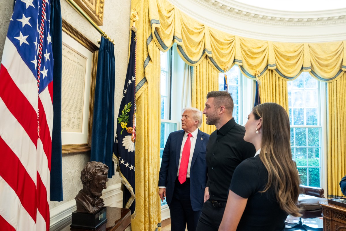 President Donald Trump poses for photos with Tim Tebow, his wife Demi-Leigh Tebow, and Secretary of State Marco Rubio, in the Oval Office, Tuesday, April 1, 2025. (Official White House Photo by Joyce N. Boghosian)