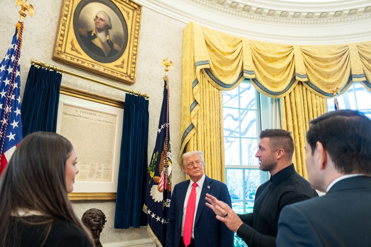 President Donald Trump poses for photos with Tim Tebow, his wife Demi-Leigh Tebow, and Secretary of State Marco Rubio, in the Oval Office, Tuesday, April 1, 2025. (Official White House Photo by Joyce N. Boghosian)
