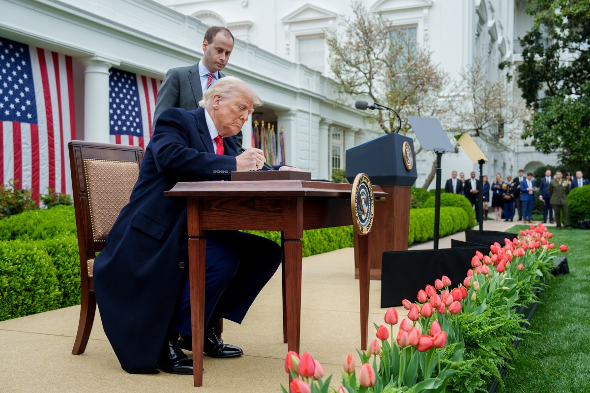 President Donald J. Trump signs an Executive Order on on the Administration’s tariff plans at a “Make America Healthy Again” event, Wednesday, April 2, 2025, in the White House Rose Gardent. (Official White House Photo by Abe McNatt)