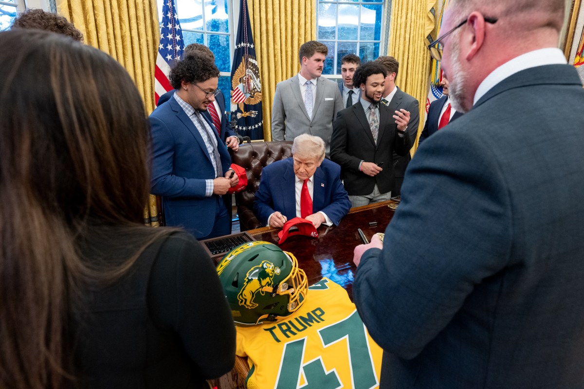 President Donald Trump poses for a photo with the North Dakota State University Bison football team, Wednesday, April 9, 2025, in the East Room of the White House. (Official White House Photo by Molly Roberts)