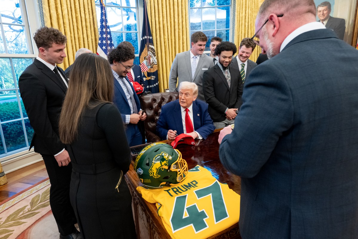 President Donald Trump poses for a photo with the North Dakota State University Bison football team, Wednesday, April 9, 2025, in the East Room of the White House. (Official White House Photo by Molly Roberts)