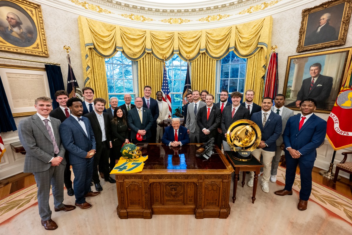 President Donald Trump poses for a photo with the North Dakota State University Bison football team, Wednesday, April 9, 2025, in the East Room of the White House. (Official White House Photo by Molly Roberts)