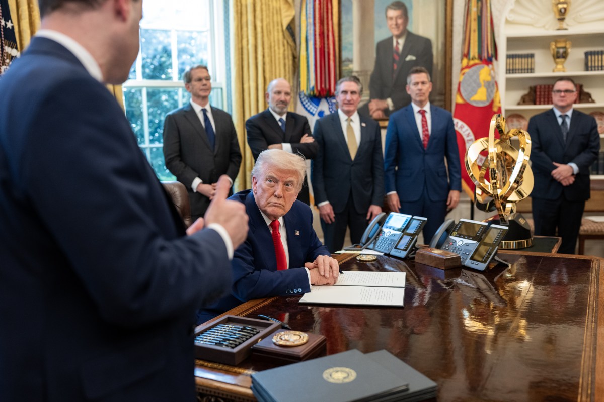 President Donald Trump signs Executive Orders, Wednesday, April 9, 2025, in the Oval Office. (Official White House Photo by Joyce N. Boghosian)