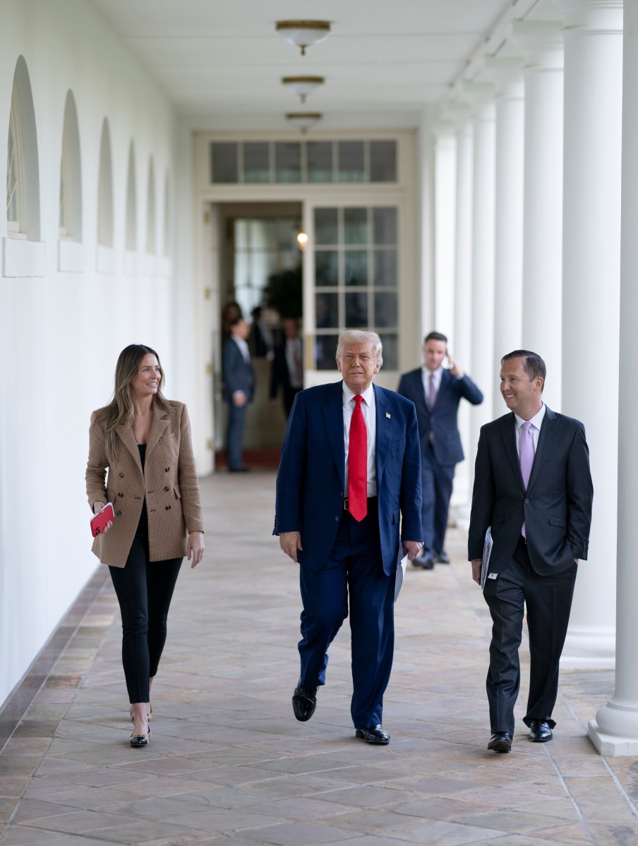 President Donald Trump walks along the West Colonnade to the Oval Office, Wednesday, April 9, 2025, after greeting the North Dakota State University Bison football team. (Official White House Photo by Molly Riley)