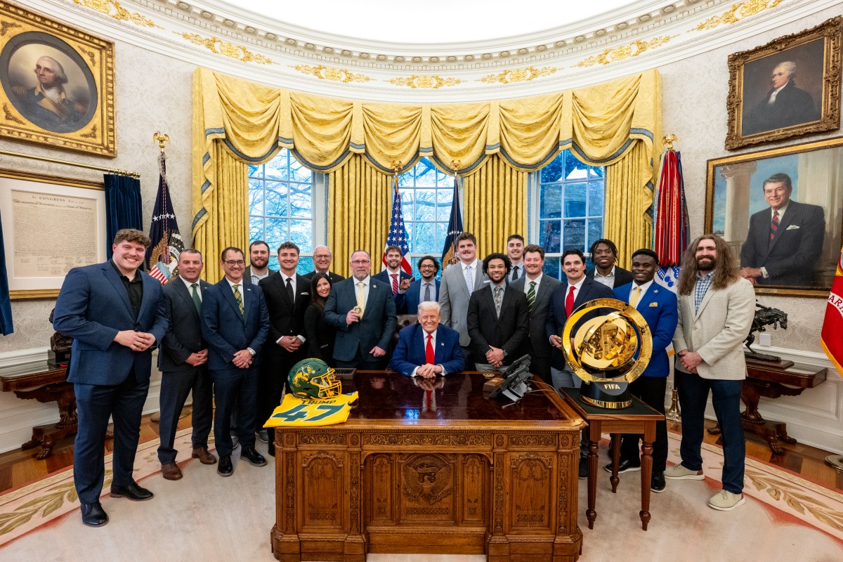 President Donald Trump poses for a photo with the North Dakota State University Bison football team, Wednesday, April 9, 2025, in the East Room of the White House. (Official White House Photo by Molly Roberts)