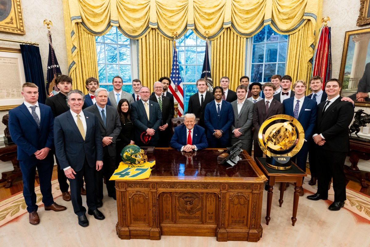 President Donald Trump poses for a photo with the North Dakota State University Bison football team, Wednesday, April 9, 2025, in the East Room of the White House. (Official White House Photo by Molly Roberts)