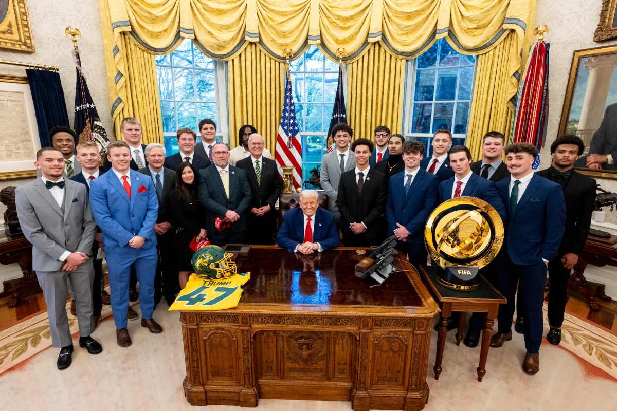President Donald Trump poses for a photo with the North Dakota State University Bison football team, Wednesday, April 9, 2025, in the East Room of the White House. (Official White House Photo by Molly Roberts)