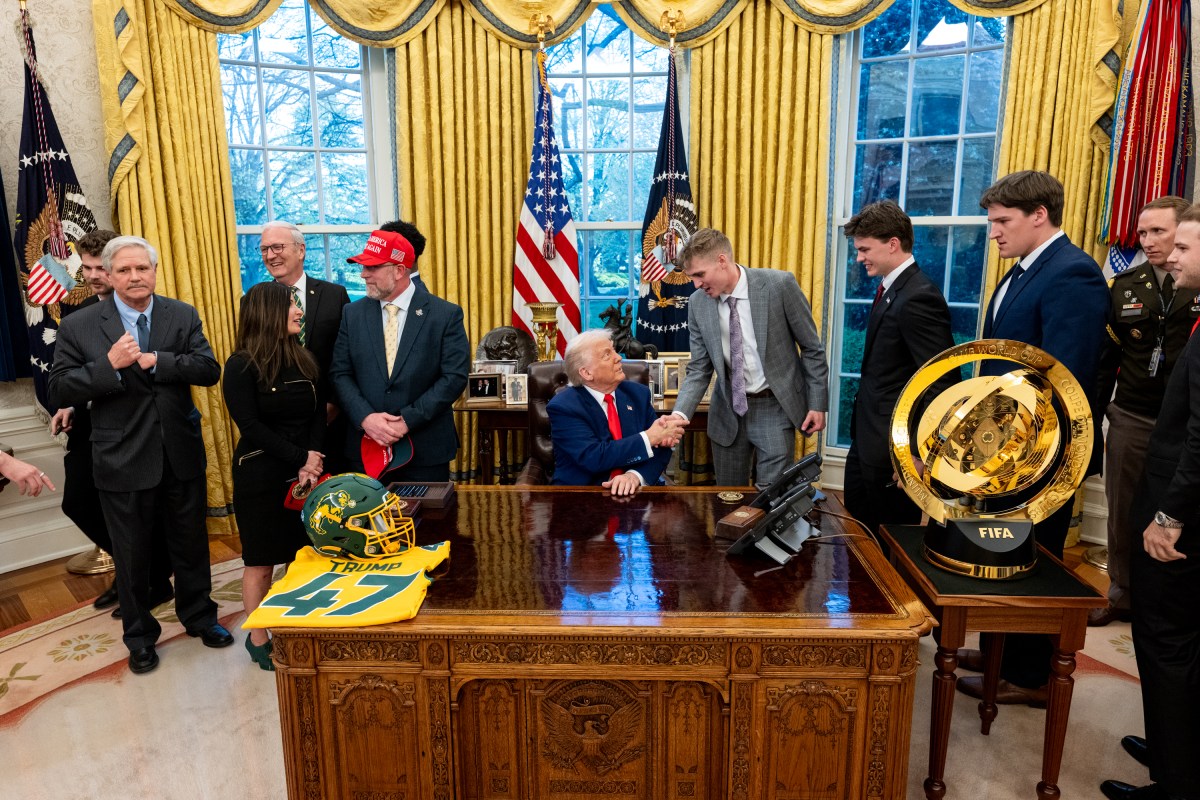 President Donald Trump poses for a photo with the North Dakota State University Bison football team, Wednesday, April 9, 2025, in the East Room of the White House. (Official White House Photo by Molly Roberts)