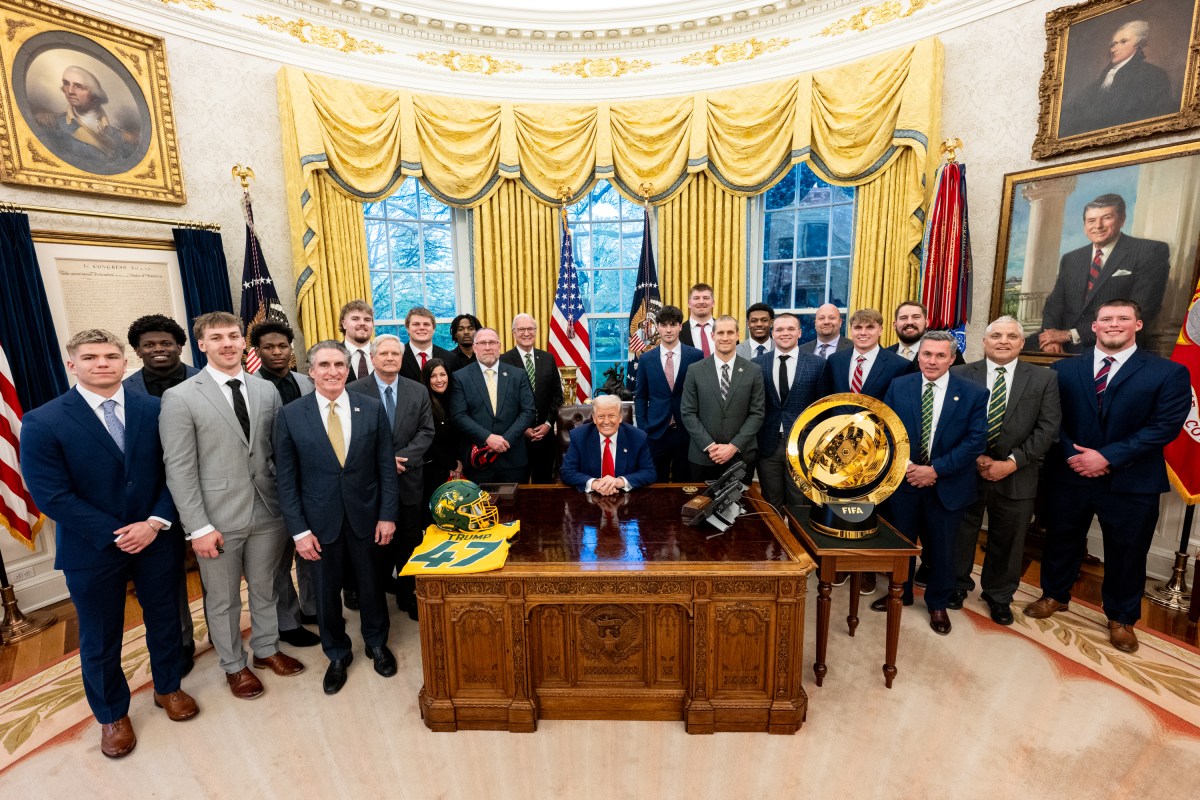 President Donald Trump poses for a photo with the North Dakota State University Bison football team, Wednesday, April 9, 2025, in the East Room of the White House. (Official White House Photo by Molly Roberts)