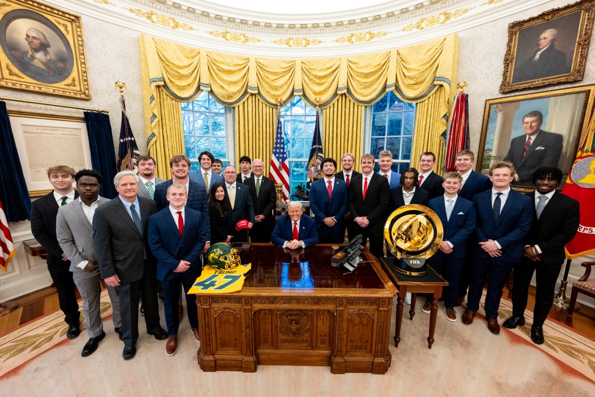 President Donald Trump poses for a photo with the North Dakota State University Bison football team, Wednesday, April 9, 2025, in the East Room of the White House. (Official White House Photo by Molly Roberts)