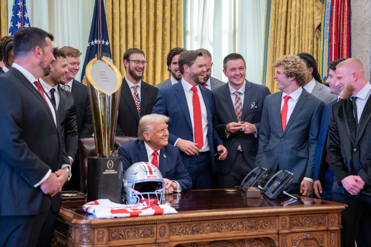 President Donald Trump and Vice President JD Vance pose for a photo in the Oval Office of the White House with the 2025 College Football National Champion Ohio State University Buckeyes, Monday, April 14, 2025.(Official White House Photo by Emily J. Higgins)