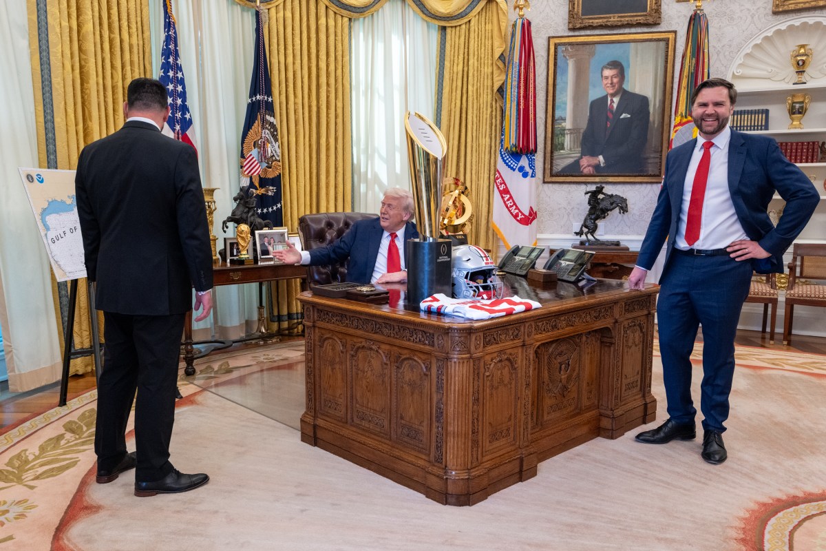 President Donald Trump and Vice President JD Vance pose for a photo in the Oval Office of the White House with the 2025 College Football National Champion Ohio State University Buckeyes, Monday, April 14, 2025.(Official White House Photo by Emily J. Higgins)