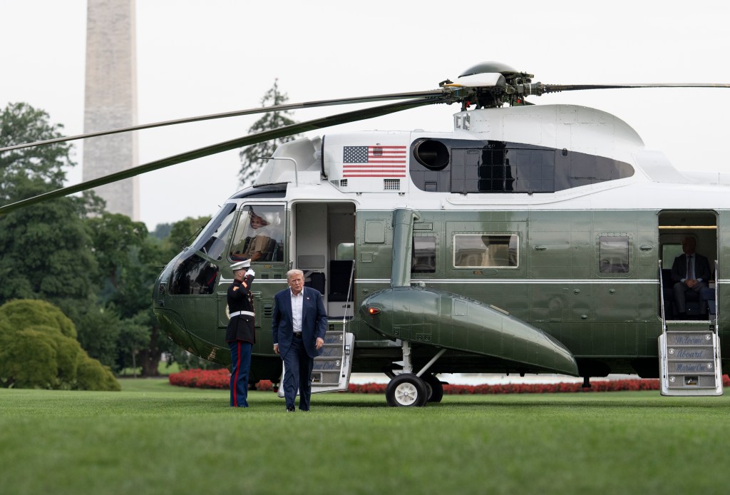 President Donald Trump disembarks Marine One on the South Lawn of the White House, Tuesday, July 29, 2025, after a trip to Scotland. (Official White House Photo by Molly Riley)