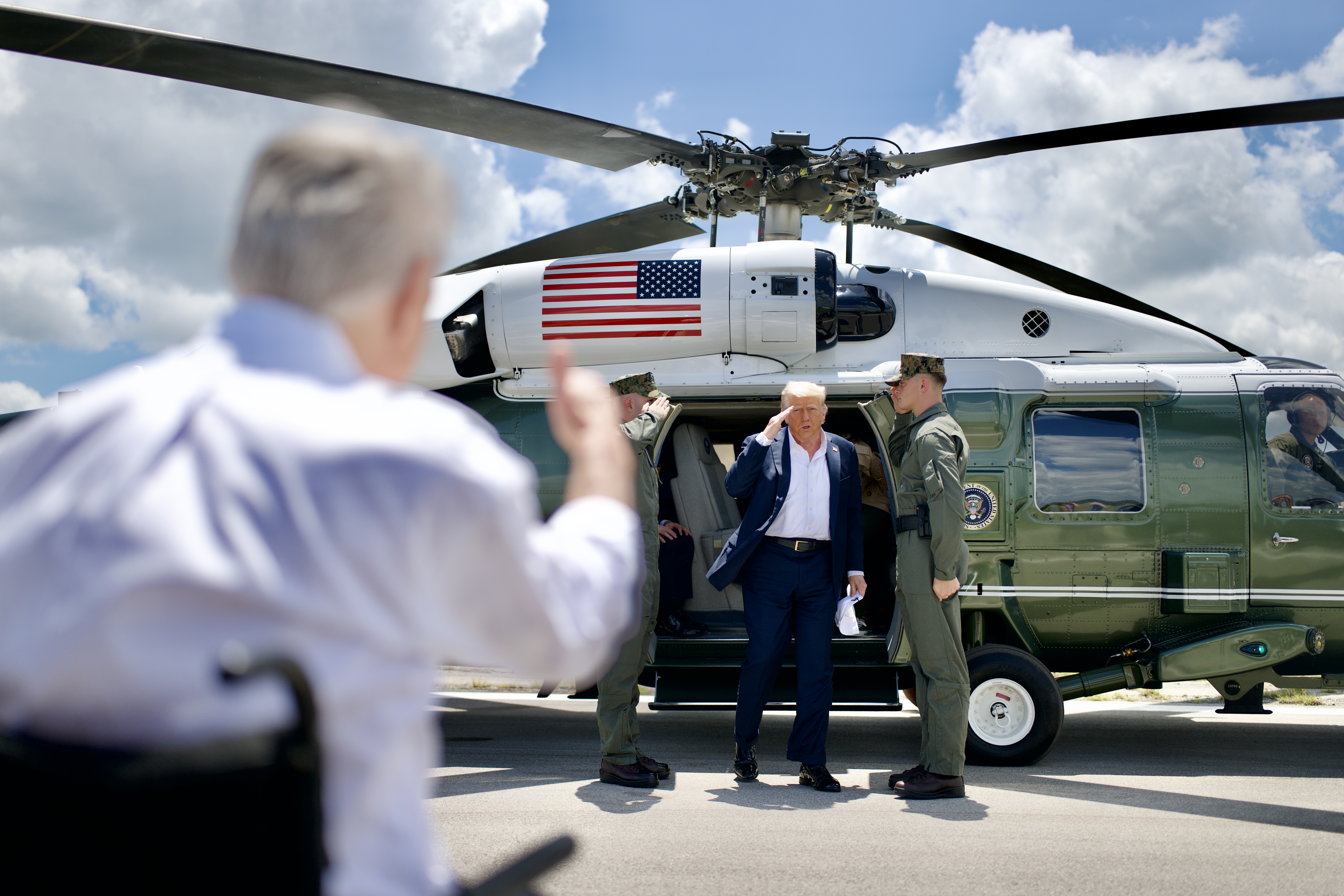 President Donald Trump and First Lady Melania Trump disembark Marine One at Kerrville Municipal Airport in Kerrville, Texas on Friday, July 11, 2025, and are greeted by Texas Gov. Greg Abbott and Cecilia Abbott. (Official White House Photo by Daniel Torok)