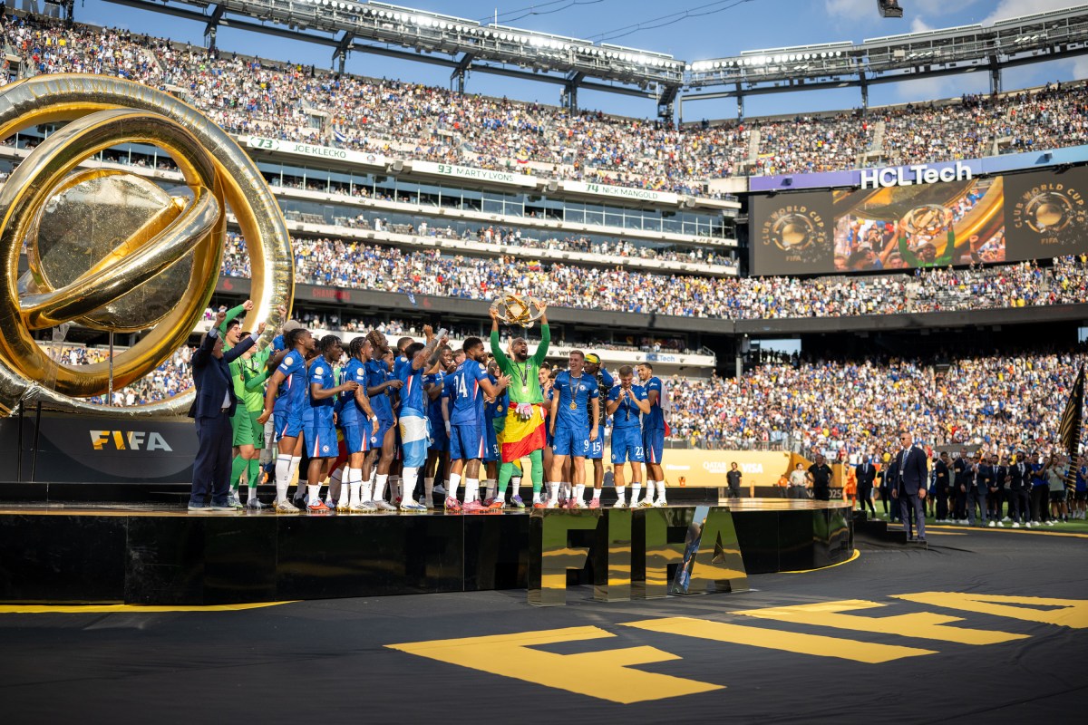 President Donald Trump celebrates with Chelsea Football Club players during a post-match ceremony at the FIFA World Cup Final, Sunday, July 13, 2025, at MetLife Stadium in East Rutherford, New Jersey. (Official White House Photo by Daniel Torok)